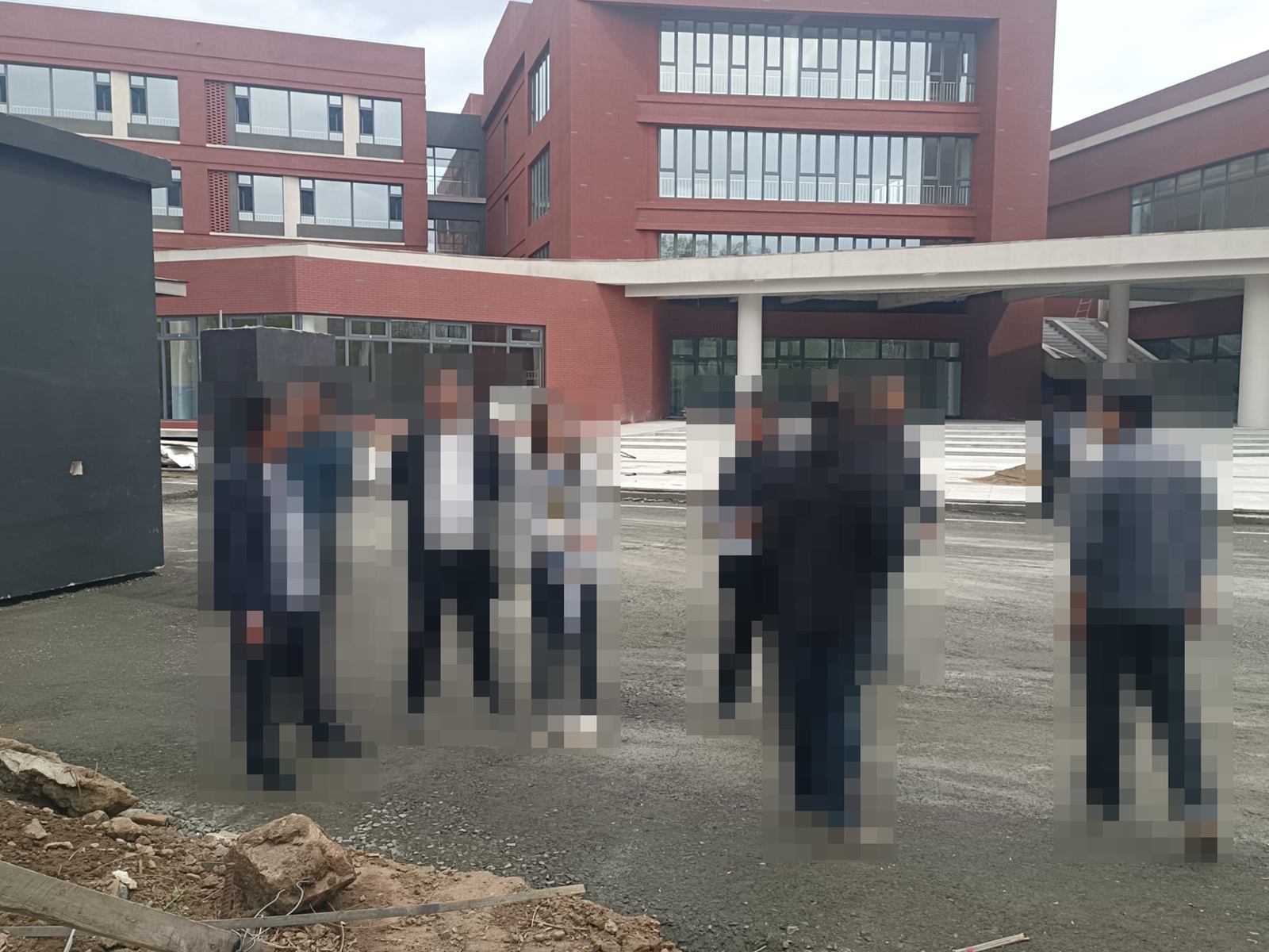 Fushun Experimental Middle School — Walking the site in front of the teaching blocks.